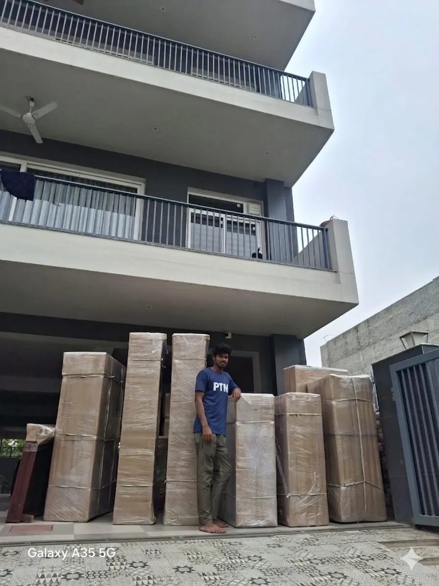 Interstate movers securing cargo in closed truck
